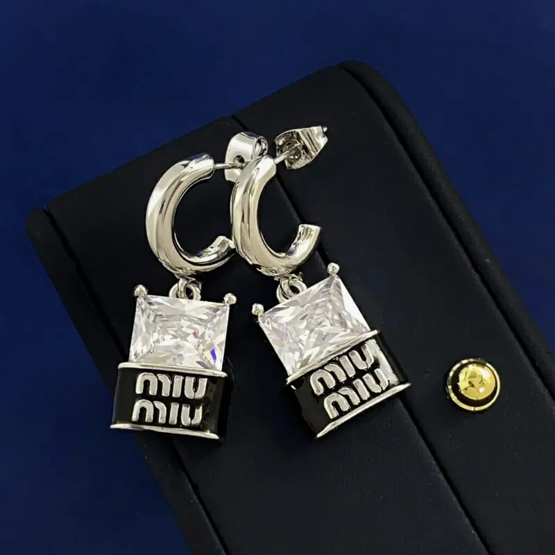 miu miu boucles doreilles pour femme s_122a456